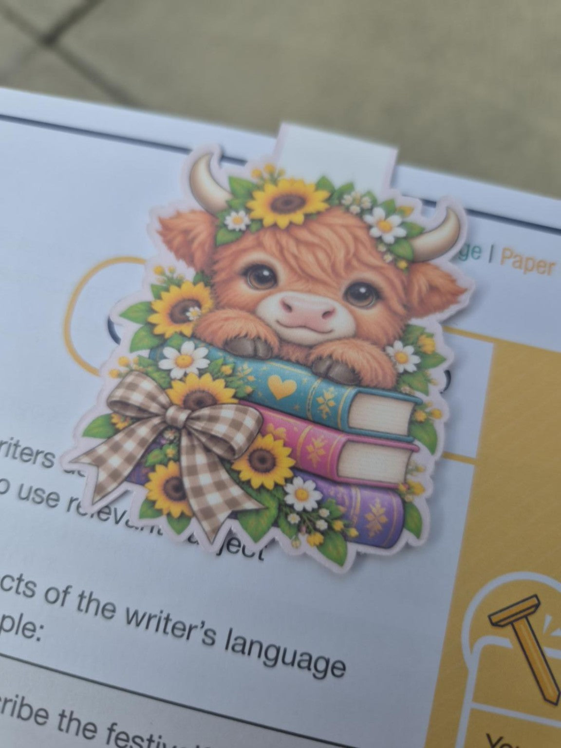 Cute Highland cow magnetic bookmark with sunflowers, daisies and colourful books