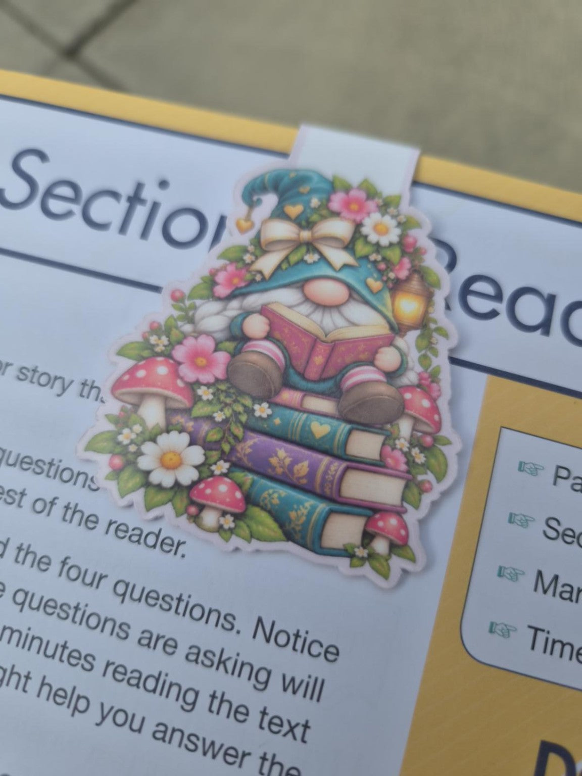Cute reading gnome magnetic bookmark with teal hat, flowers, mushrooms and books